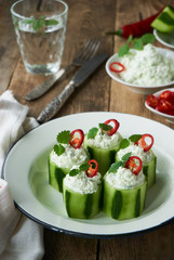 Stuffed cucumbers with cottage cheese, hot pepper and garlic   