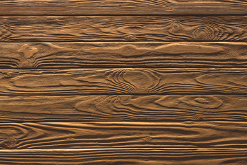 Wooden fence horizontal planks background painted in brown