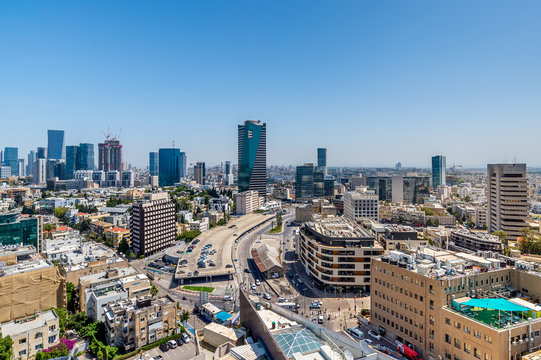Rooftop view of Tel Aviv center.. Old houses and modern skyscrapers.