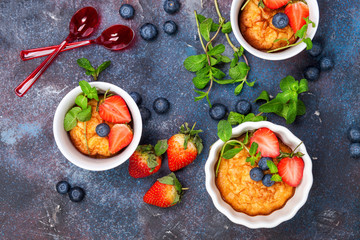 Berries cottage cheese casserole. Selective focus. Top view. Copy space