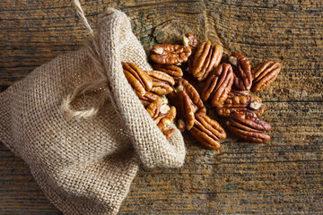 Pecan nuts in small sack