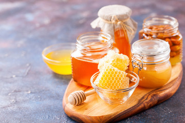 Honey on a board. Selective focus.