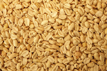Close up of peanuts. Texture for background. Copy space for text.