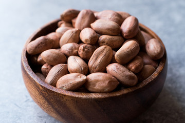 Organic Raw Hazelnuts in Wooden Bowl
