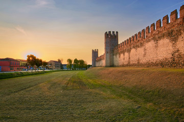 Montagnana, Italy - August 25, 2017: The fortress wall of the city in the evening.