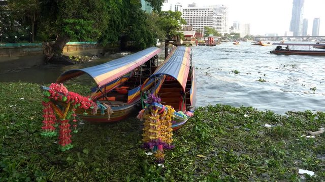 Longtail boat on river in Bangkok, Thailand.