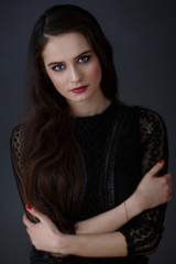 Naklejka premium sexual woman portrait in darkness