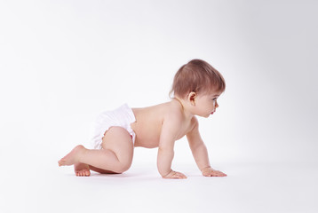 Baby crawling at studio shot