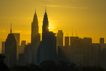 Fototapeta na wymiar Majestic sunrise over downtown Kuala Lumpur, Malaysia