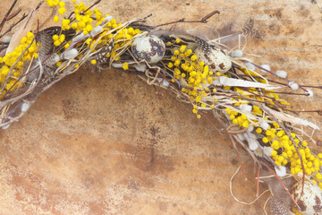 Easter egg flower wreath closeup with copyspace. Handmade composition 