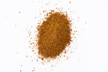 Curry powder isolated on white.