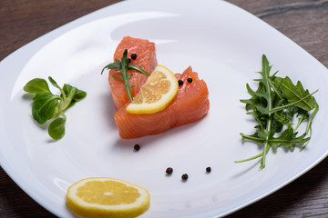 Salmon, arugula, lemon