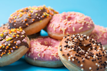 Assorted donuts on a blue background