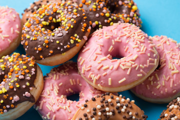 Assorted donuts on a blue background