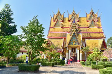 Fototapeta premium Golden Buddhist Shrine at Wat Wang Wiwekaram in Sangkhlaburi, Thailand