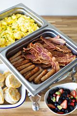 Breakfast buffet with scrambled eggs and bacon