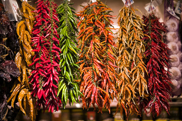 Obraz premium Low Angle View Of Chili Peppers For Sale At Market