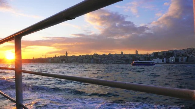 Sunset over Istanbul. Shooting from the ferry that sails along the Bosphorus.
