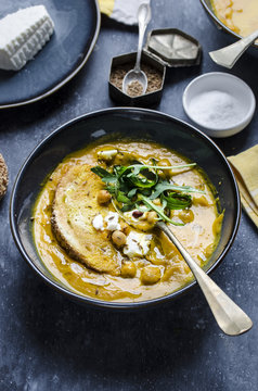 Carrot and pumpkin soup with crispy chikpeas and ricotta