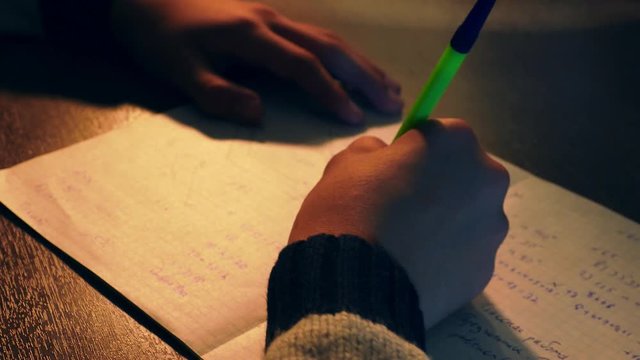Close up of schoolchild doing homework