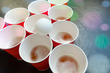 Beer pong. Popular game at parties. Place for your text.