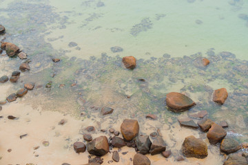 Merissa, Sri Lanka, Parrot Rоck. Huge boulders on the beach.