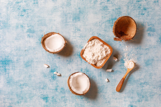 Coconut Flour In Old Bowl On Wooden Table, Top View, Overhead