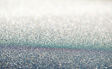Obraz premium Glitter background with blue and pink streaks