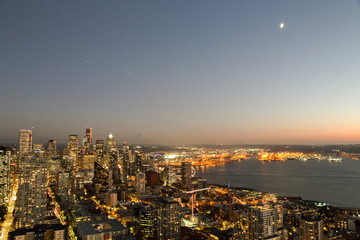 Fototapeta premium A View Over Elliott bay and Seattle Urban Downtown City Skyline Buildings Waterfront from Space needle