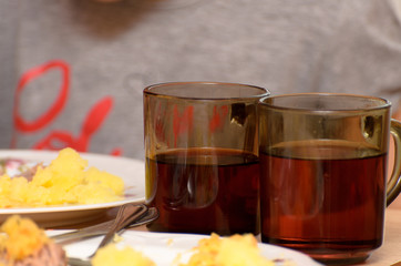 Glasses are standing on the table during dinner