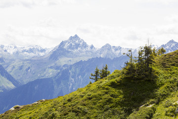 Alps panorama in Montafon, Austria. Backlit Photograph
