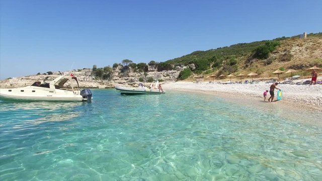 Boat parked next to beach in Albania