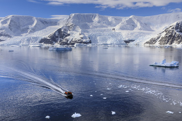 Early morning on a gorgeous day, elevated view of zodiac boat in Neko Harbour, Andvord Bay, Antarctic Continent, Antarctica