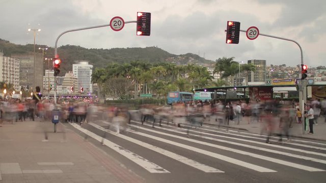 Time lapse - Crosswalk in front of the city bus terminal, pedestrians and cars in the city's uptown. Florian&oacute;polis, Santa Catarina / Brazil