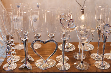 Luxury wedding decorated with rhinestones glasses of champagne. Selective focus