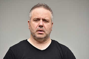 Fototapeta premium Unshaven Caucasian Male And Confusion