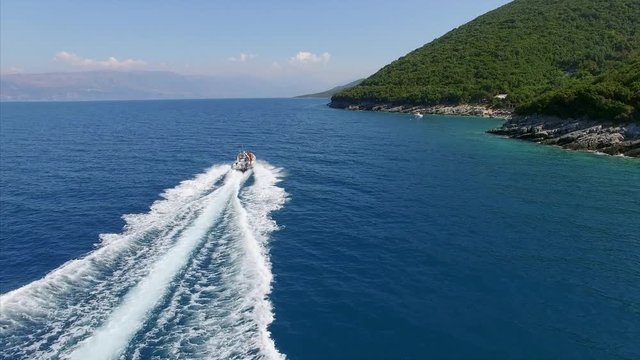 Boat traveling near land in Albania
