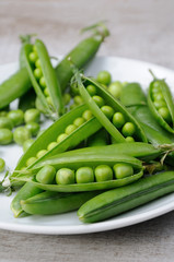 Pods of fresh green peas