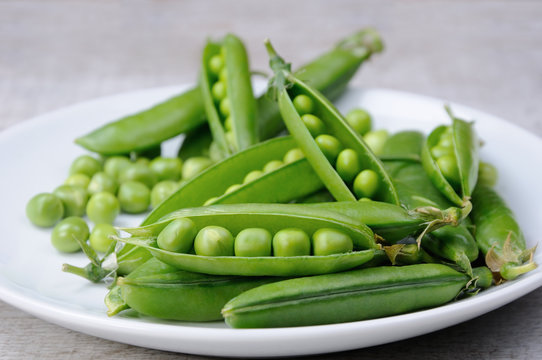 Pods of fresh green peas
