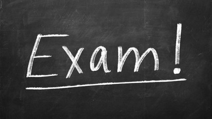 Blackboard with word EXAM