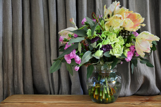 a provence style bouquet of different romantic flowers