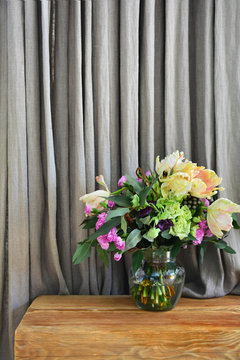 a provence style bouquet of different romantic flowers
