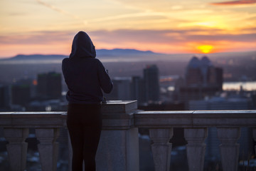 Photographer taking picture of beautifull sunset in Montreal