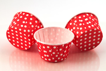 Red paper forms for making homemade cakes.