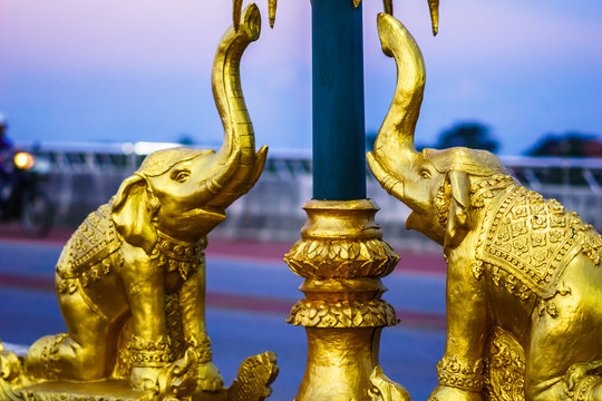 View on golden elephant statue on bridge by Chiang Rai - Thailand
