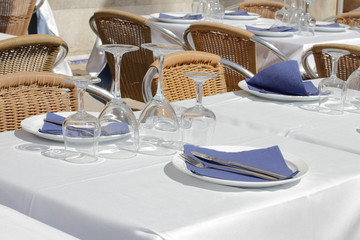 served table is waiting for people, street cafe in Spain