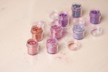 Multi-colored Sequins for the design of nails in a box. Glitter in jars. Foil for nail service....