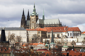 Obraz premium Early Spring Prague gothic Castle with the Lesser Town above River Vltava in the sunny Day, Czech Republic