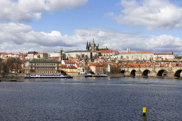 Early Spring Prague gothic Castle with the Lesser Town above River Vltava in the sunny Day, Czech...