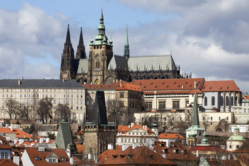 Obraz premium Early Spring Prague gothic Castle with the Lesser Town above River Vltava in the sunny Day, Czech Republic